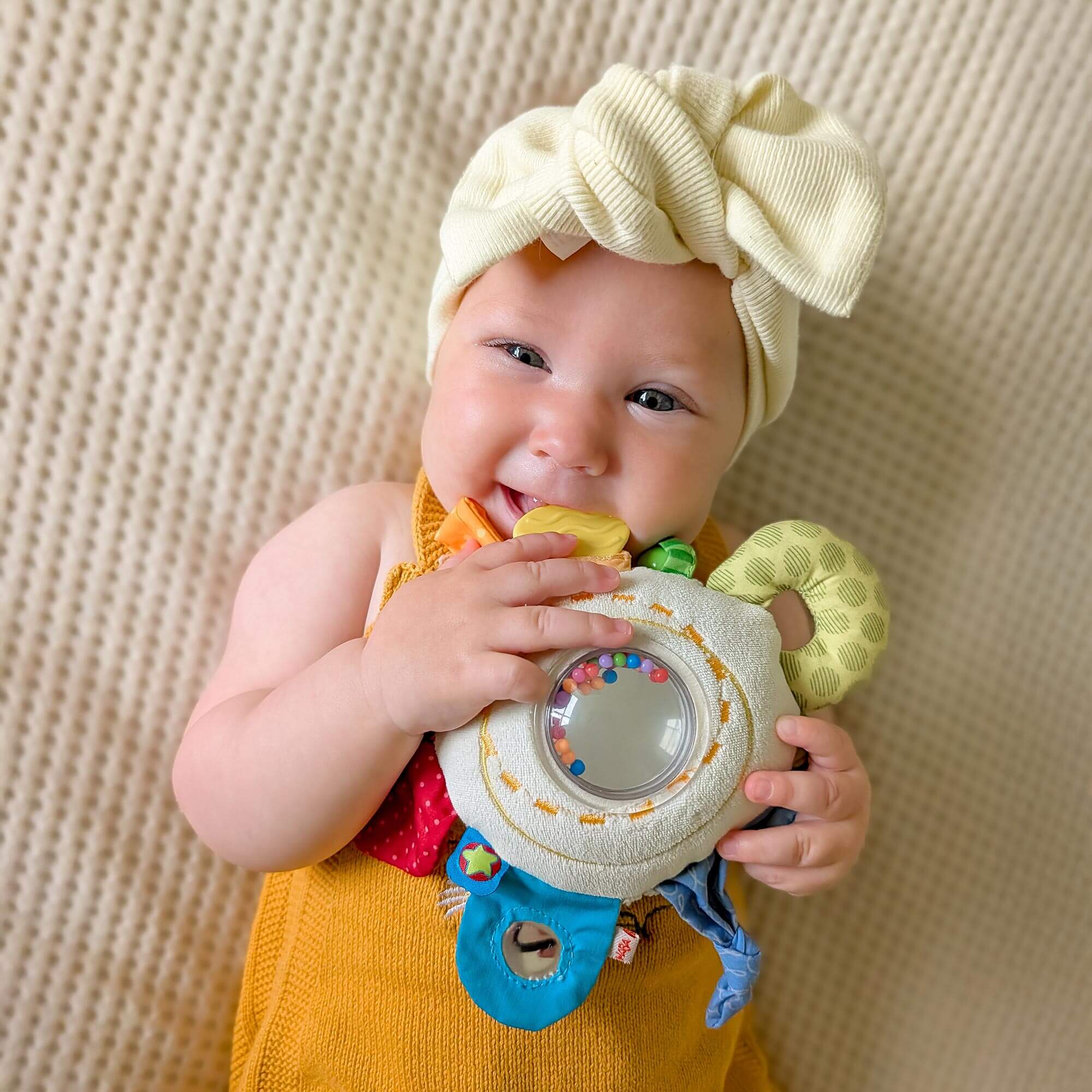 HABA Cuddly Rainbow Round Plush Teether Activity Toy