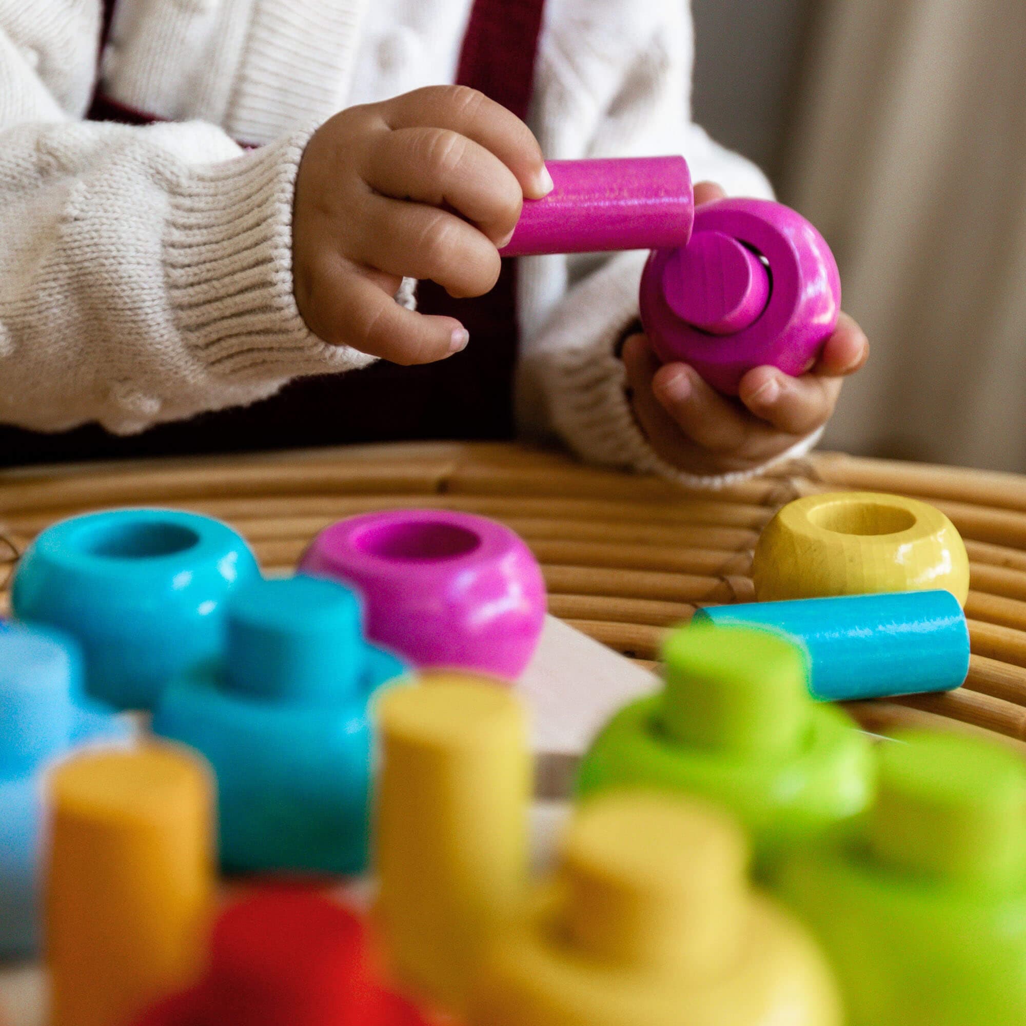 Rainbow Whirls Wooden Sorting and Stacking Game for Toddlers