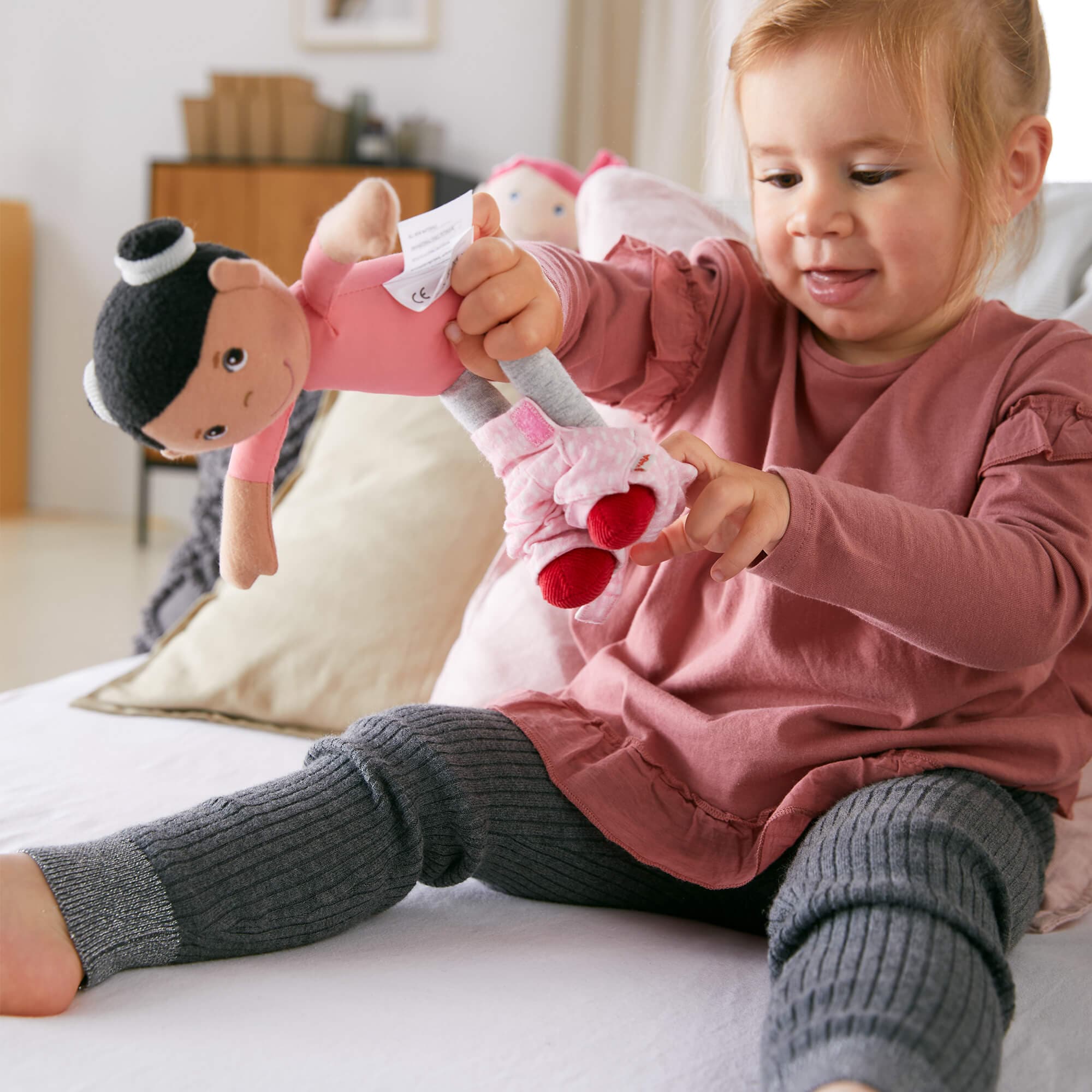 Snug Up Doll Rumbi: Soft Baby Doll with Removable Overalls and Pocket